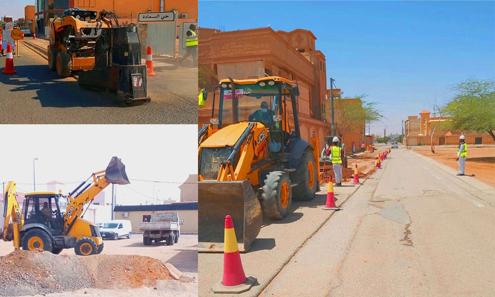 Hadaleen plant and crews trenching and laying cable routes on a city street, with the work zone secured by traffic cones